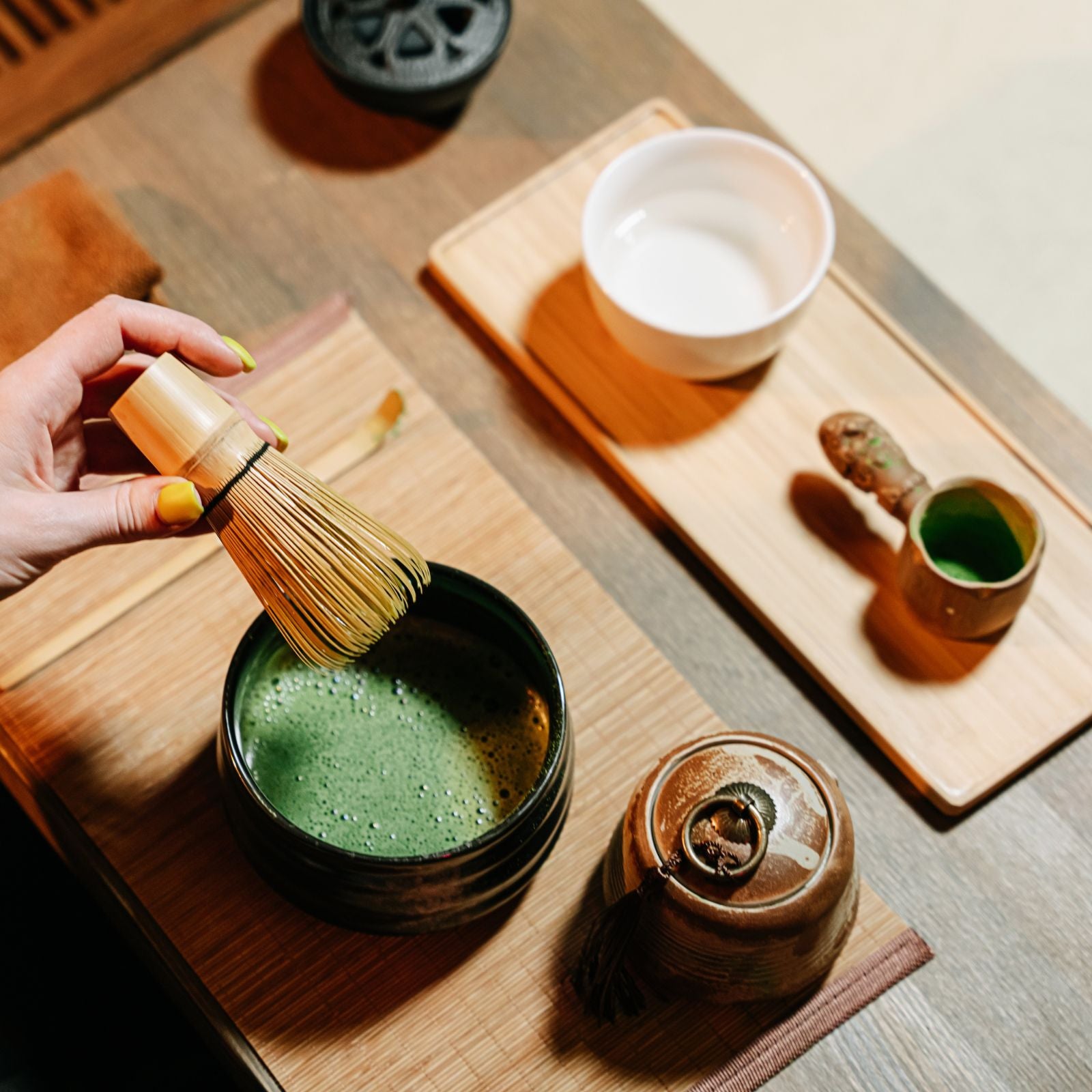 woman is making a matcha