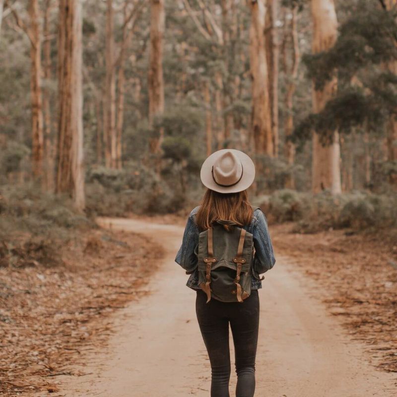 women walking in the forest