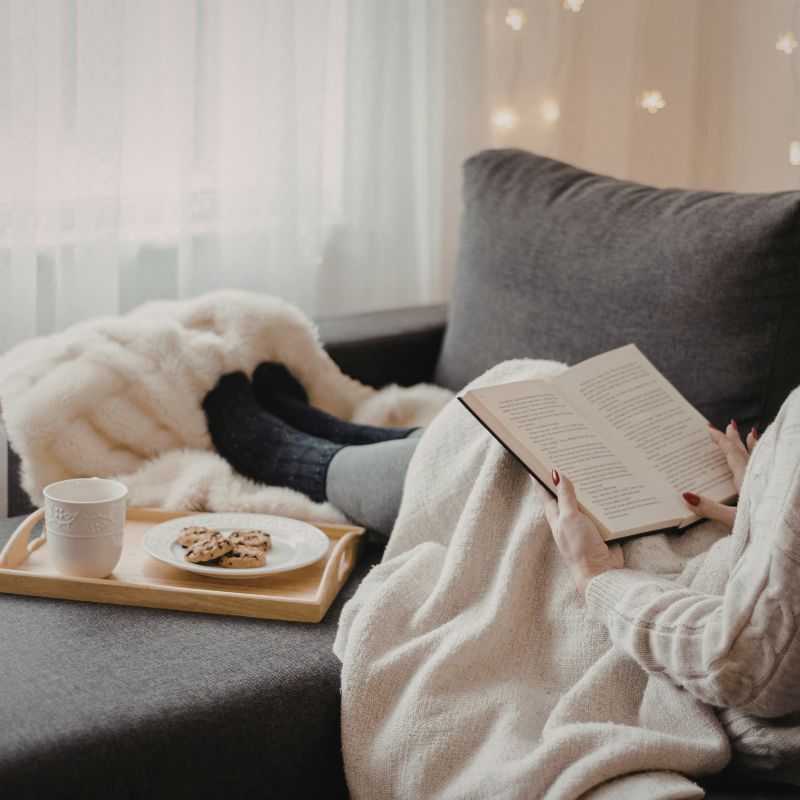 Quiet reading moment at home with tea