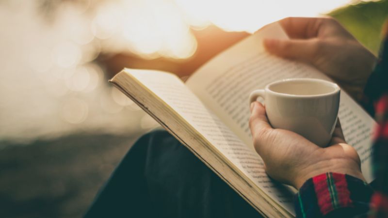 a human is reading a book
