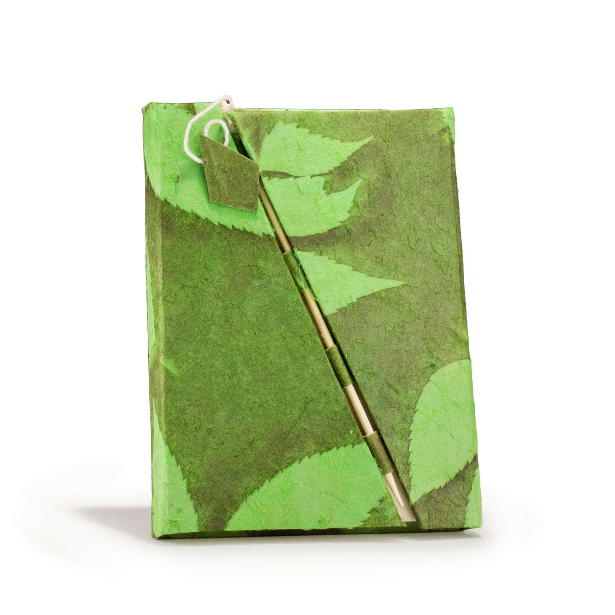 Moss green Lokta paper journal with botanical cover and bamboo lock