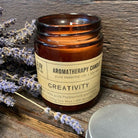 Peppermint and clove aromatherapy soy candle in reusable glass jar