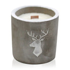 Whiskey and woodsmoke soy candle in raw concrete vessel with wooden wick