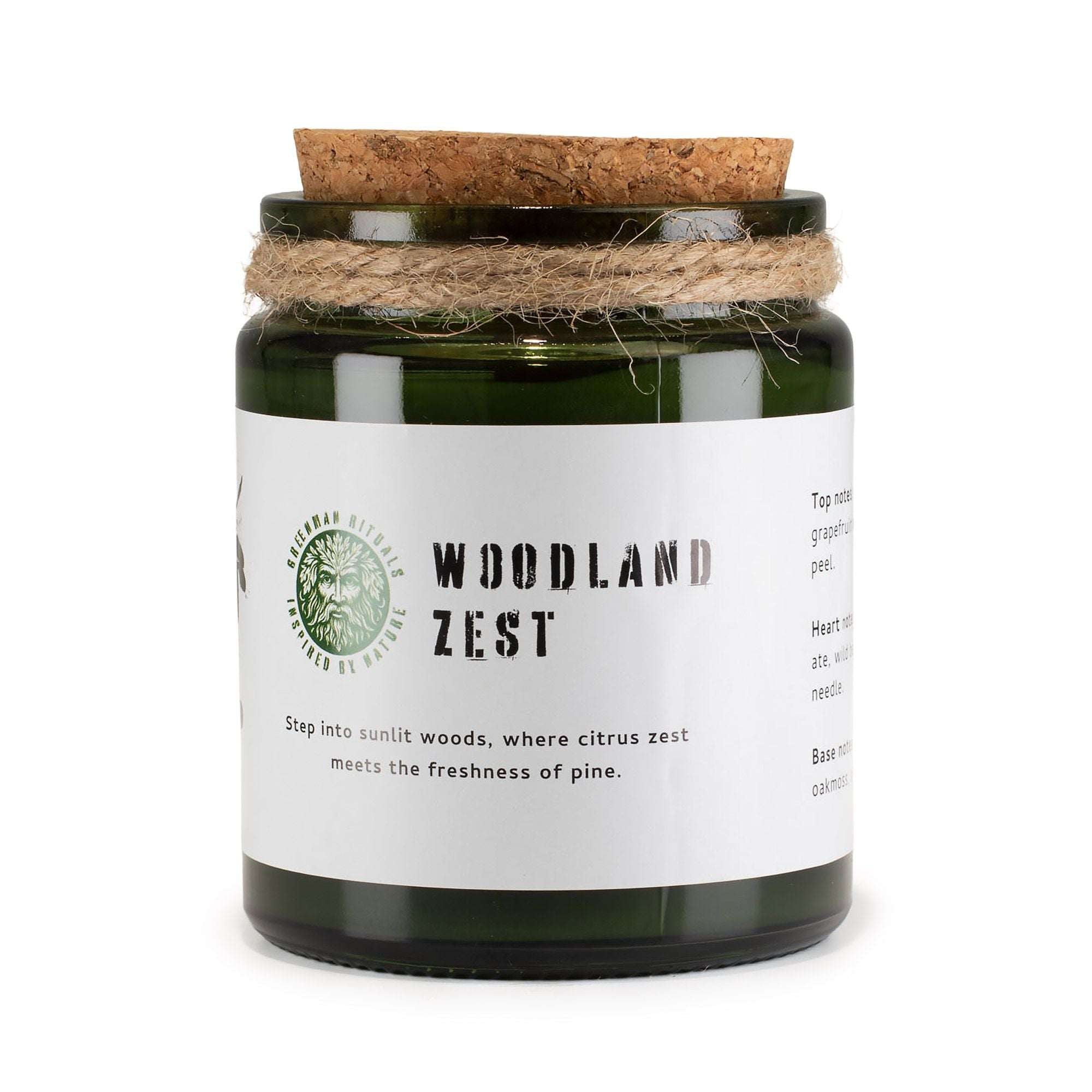 Woodland Zest citrus soy candle in green glass jar with wooden wick and cork lid